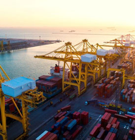 port cranes over cargo ship